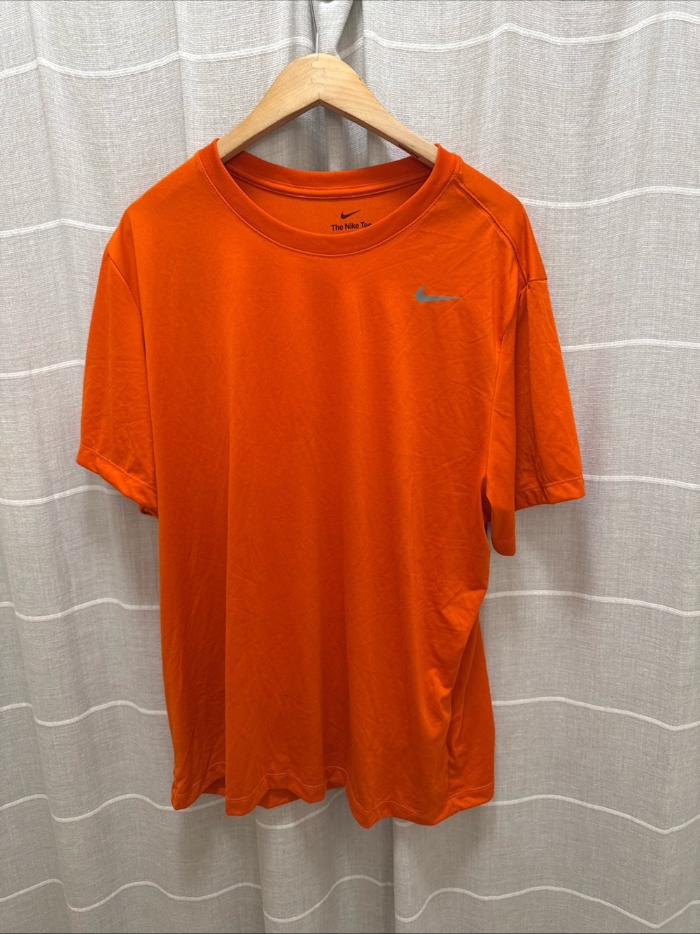 Nike Orange Short-Sleeve Athletic Tee with Reflective Swoosh